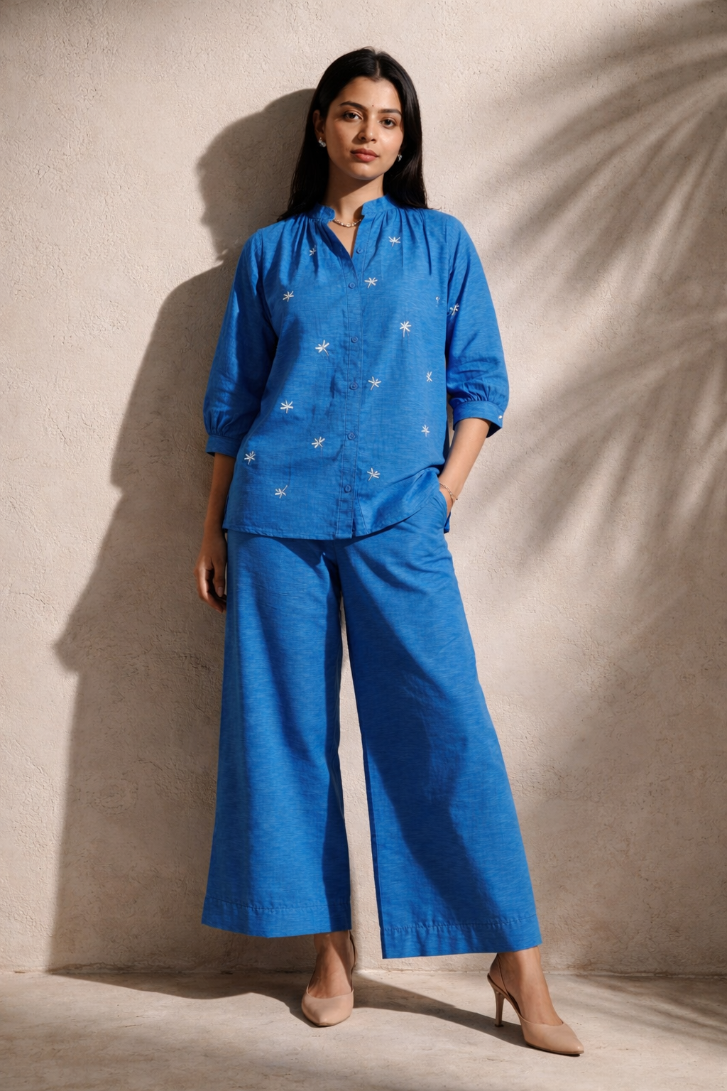 Blue embroidered co-ord set with wide-leg pants and button-up top, stylish women's outfit