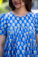 Blue floral dress with puff sleeves and yellow trim, perfect for trendy women's everyday styles.