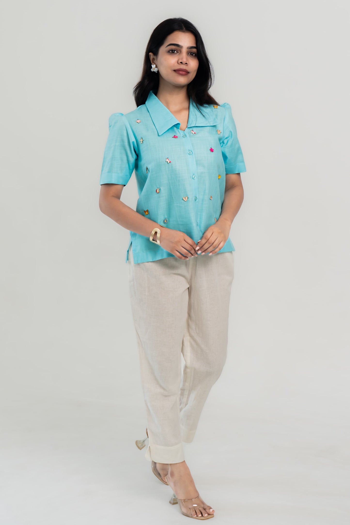 Trendy turquoise embroidered shirt with beige pants, stylish women's co-ord set for everyday wear