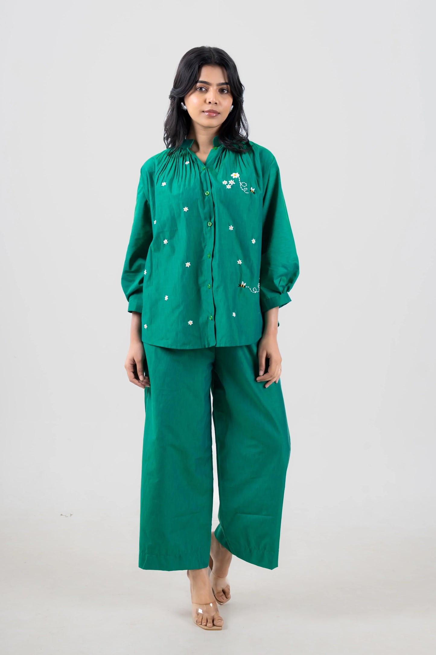 Green embroidered co-ord set with daisy and bee details, wide-leg pants, button-up top