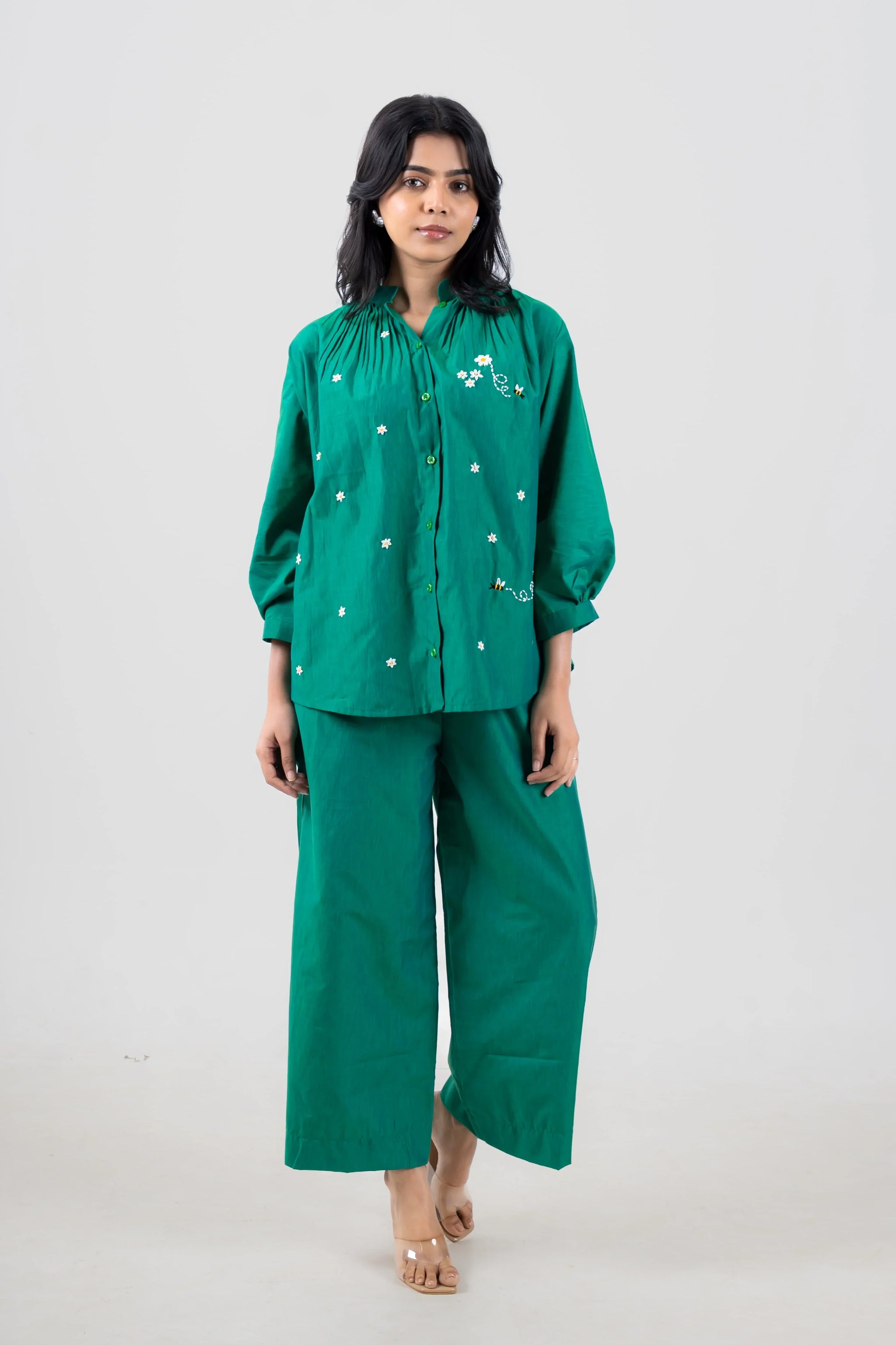 Green embroidered co-ord set with daisy and bee details, wide-leg pants, button-up top