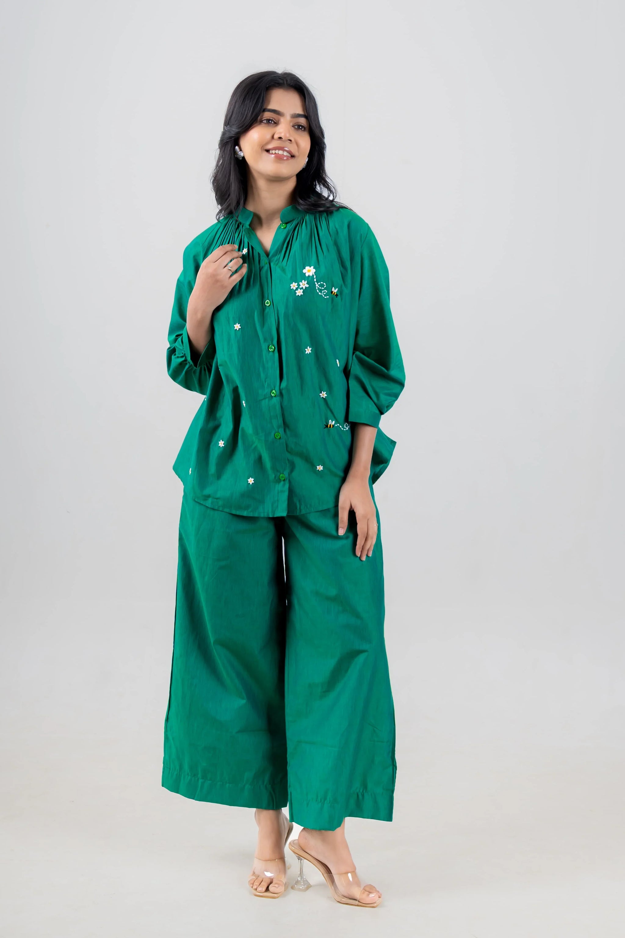Emerald green embroidered co-ord set with daisy and bee details, wide-leg pants, button-up top