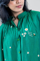Green embroidered blouse with daisy and bee details, stylish women's fashion