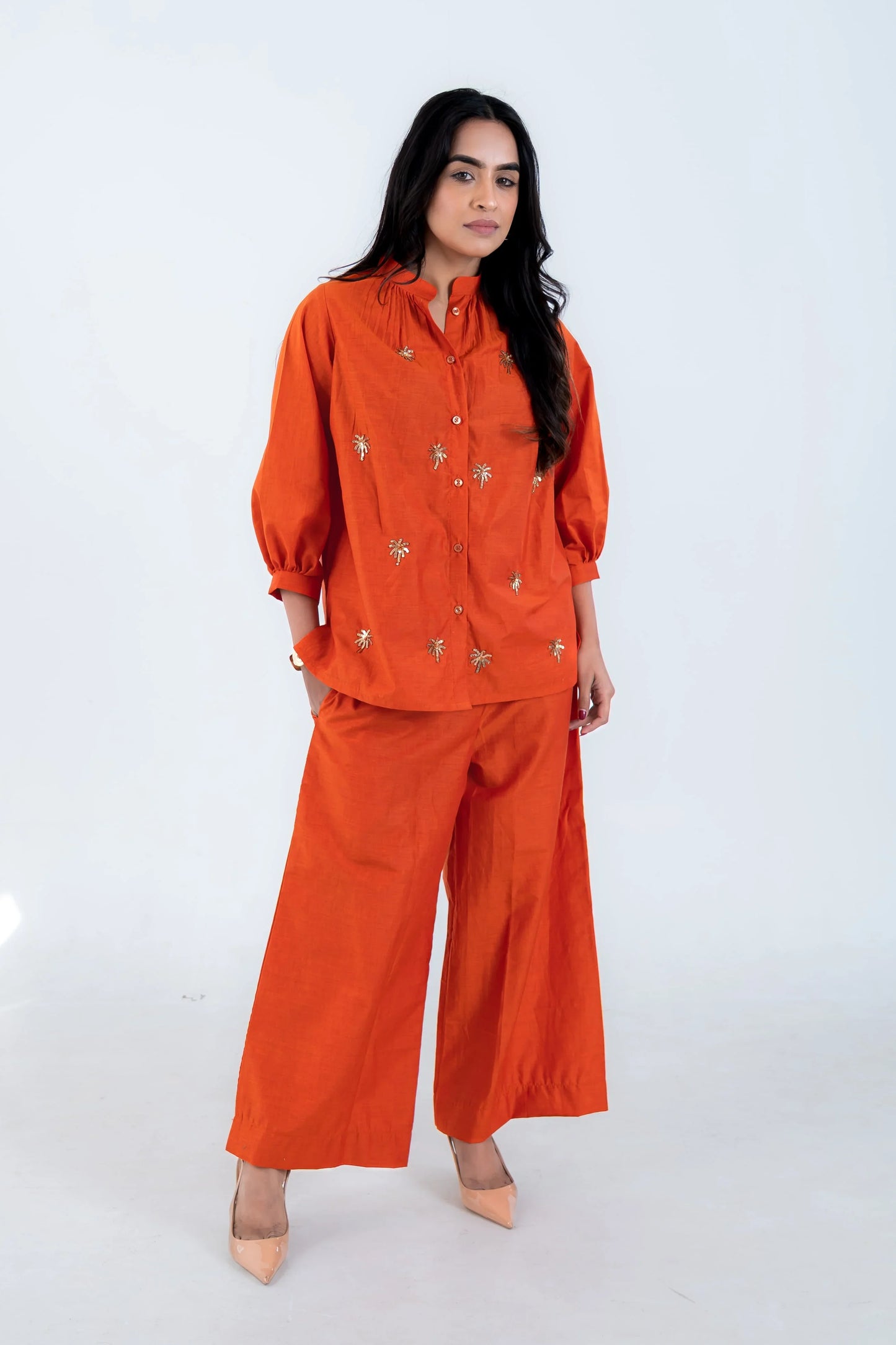 Orange embroidered co-ord set with wide-leg pants and button-up top for women