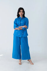 Blue embroidered co-ord set with wide-leg pants and button-up top for women