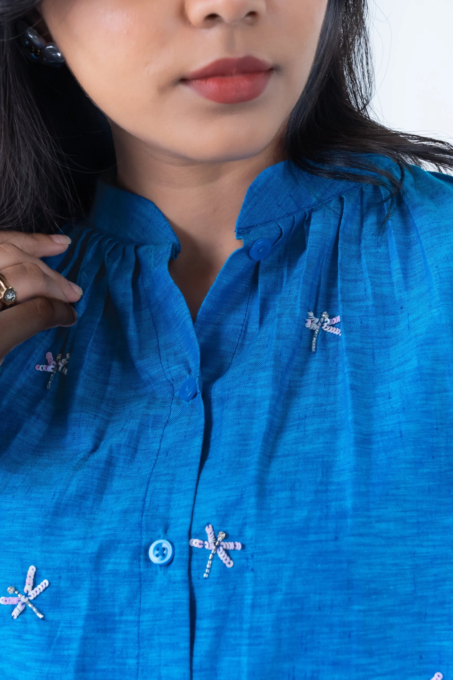 Blue button-up shirt with dragonfly embroidery, stylish women's fashion
