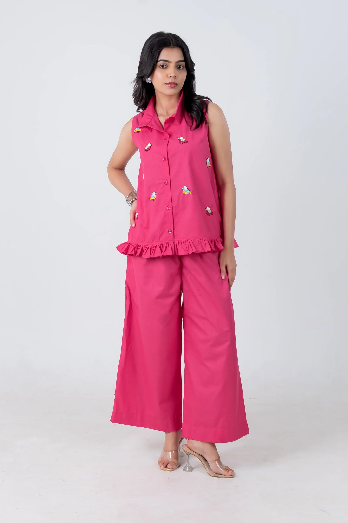 Pink sleeveless bird-embroidered co-ord set with ruffle hem and wide-leg pants