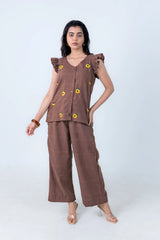 Brown floral co-ord set with sunflower embroidery, ruffle sleeves, and wide-leg pants for women