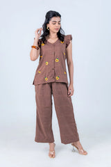 Brown sunflower-embroidered co-ord set with ruffle sleeves and wide-leg pants for women