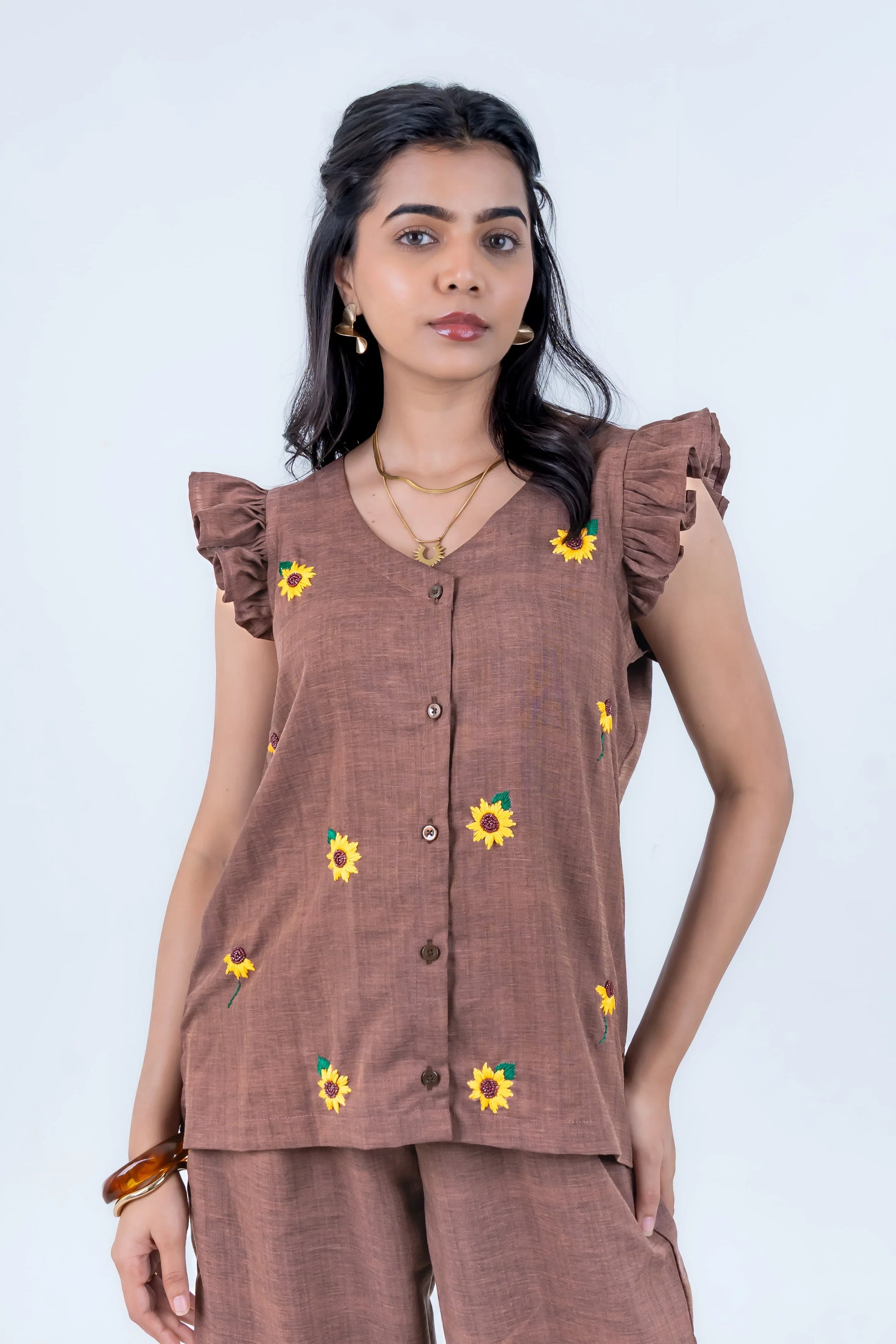 Brown sunflower-embroidered top with ruffled sleeves and matching pants