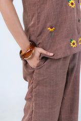 Brown linen co-ord set with sunflower embroidery, paired with amber bangle, stylish women's fashion