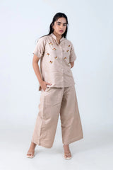 Beige women's co-ord set with bee embroidery, button-up top and wide-leg pants, stylish everyday wear