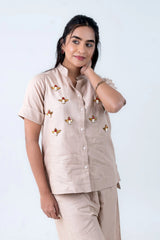 Beige women's co-ord set with bee embroidery, button front top and matching pants, stylish everyday wear
