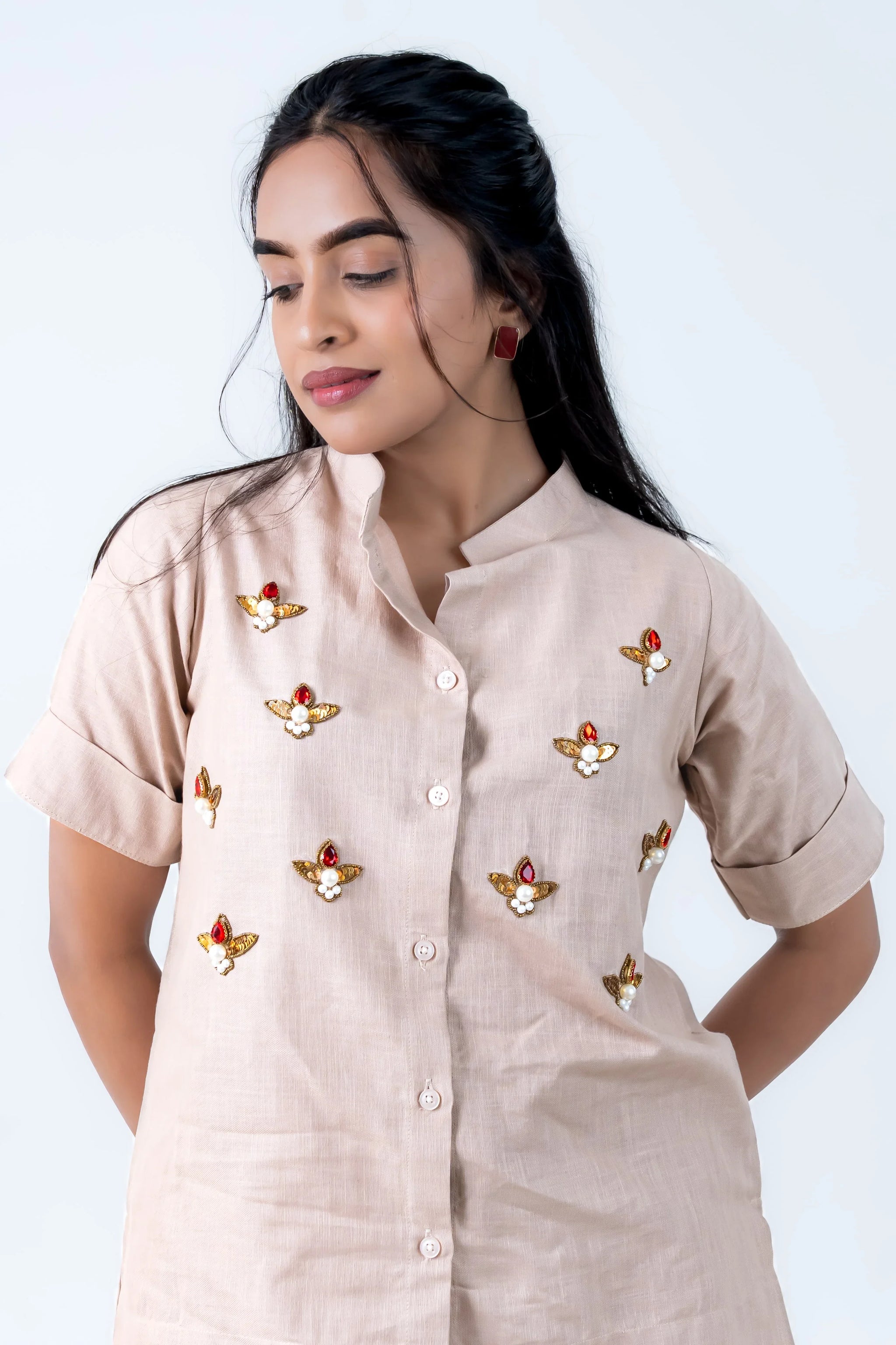 Beige button-down dress with gold bee embroidery and pearl details, stylish women's fashion