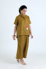 Mustard women's co-ord set with mushroom embroidery, button-up top and wide pants, stylish everyday wear