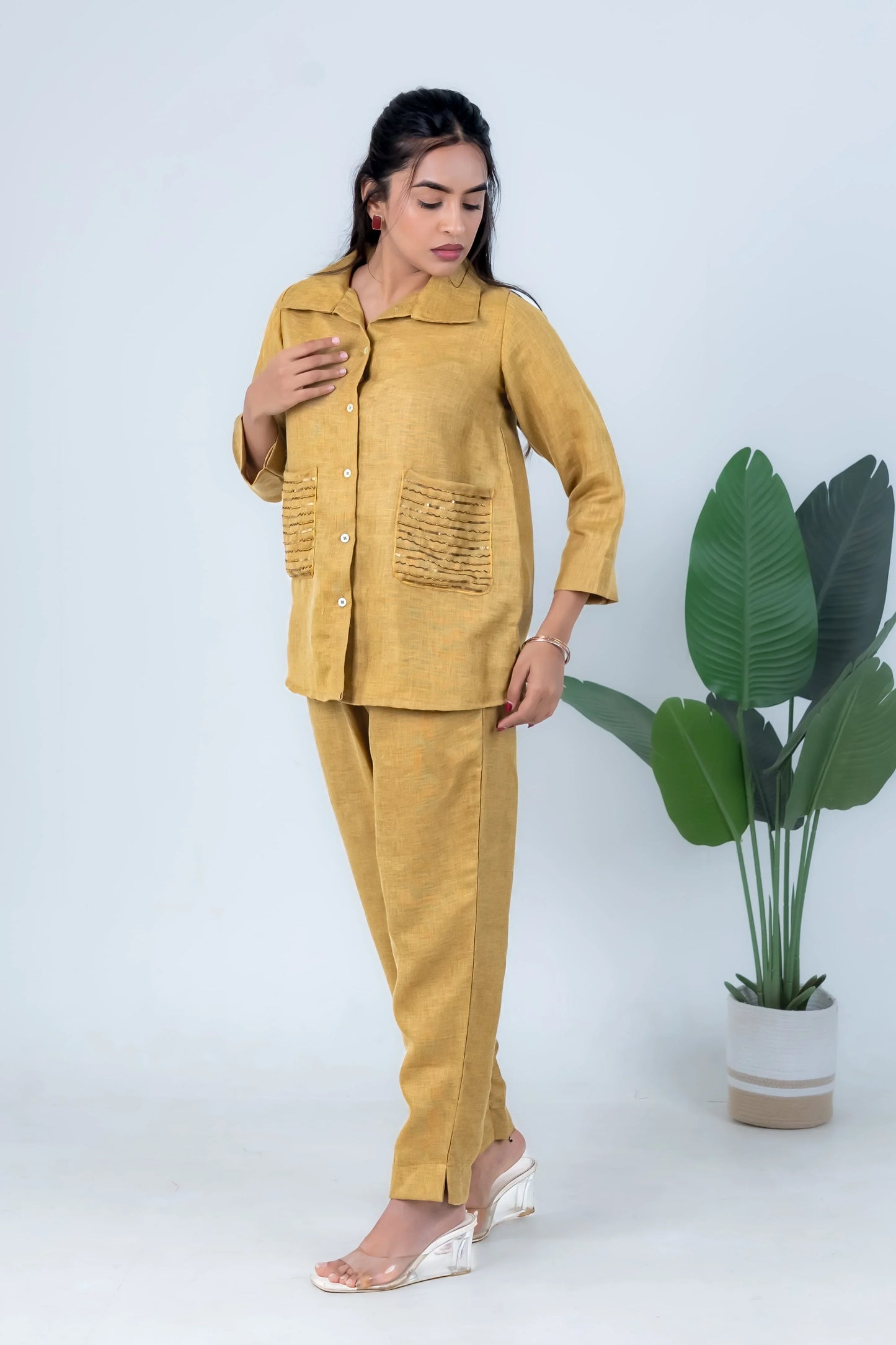 Mustard yellow women's co-ord set with embroidered pockets, button-front top and matching pants