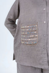 Grey button-up shirt with sequin and bead embellished pocket detail