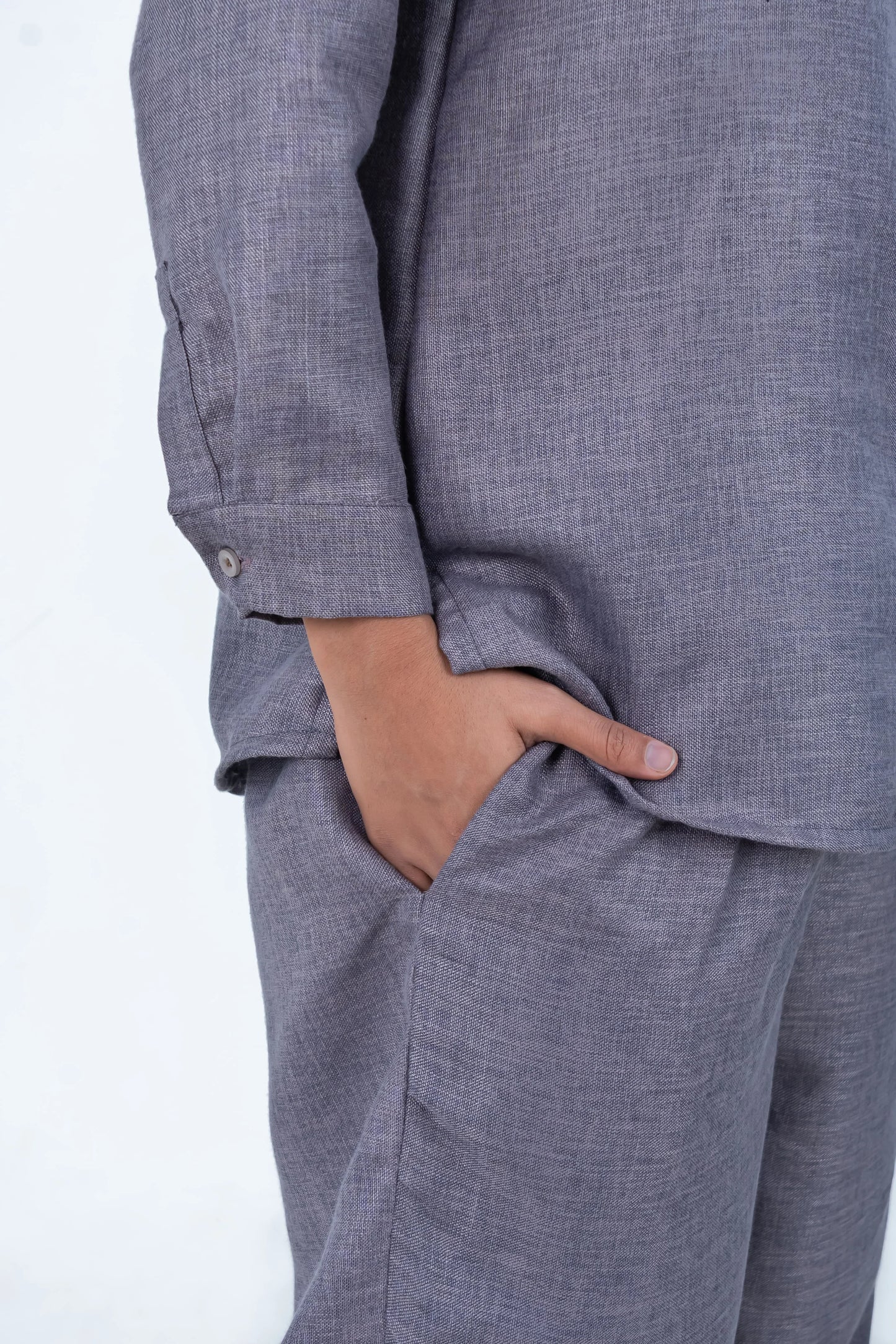 Gray linen co-ord set with rolled sleeves and side pockets for casual comfort