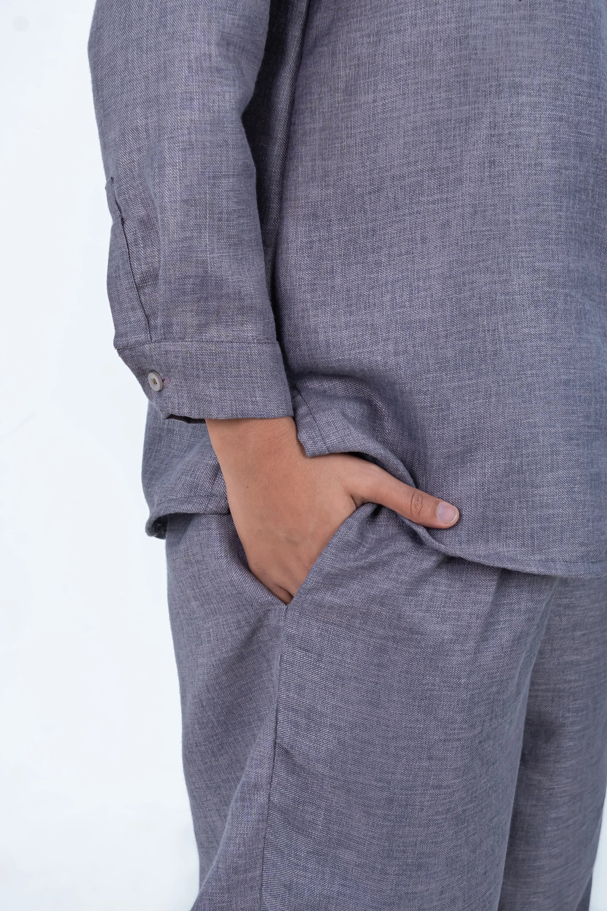 Gray linen co-ord set with rolled sleeves and side pockets for casual comfort