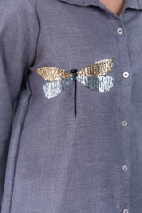 Gray shirt with sequin dragonfly design, gold and silver wings, black beaded body