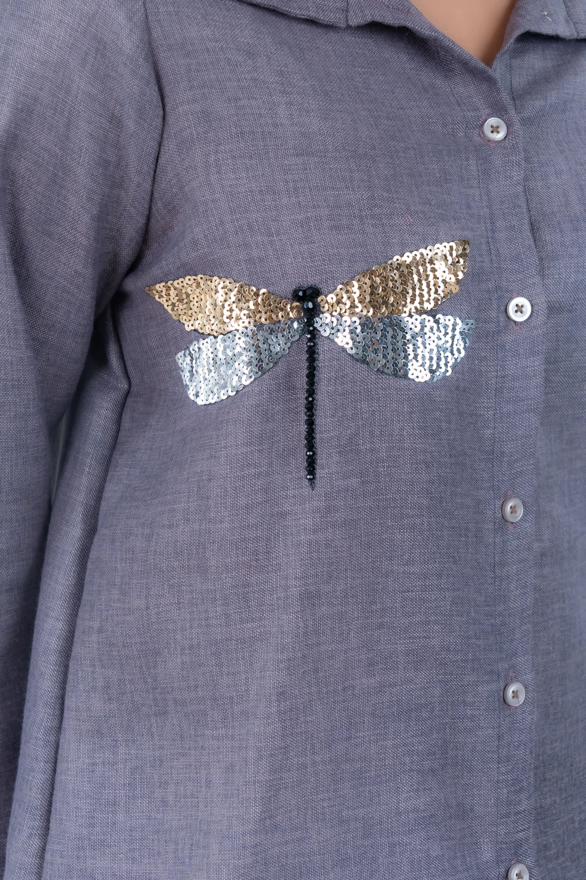 Gray shirt with sequin dragonfly design, gold and silver wings, black beaded body