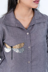 Grey button-down shirt with gold and silver sequin dragonfly embellishment, stylish women's fashion