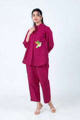 Magenta women's co-ord set with sequin hummingbird embroidery, long sleeves, and wide-leg pants