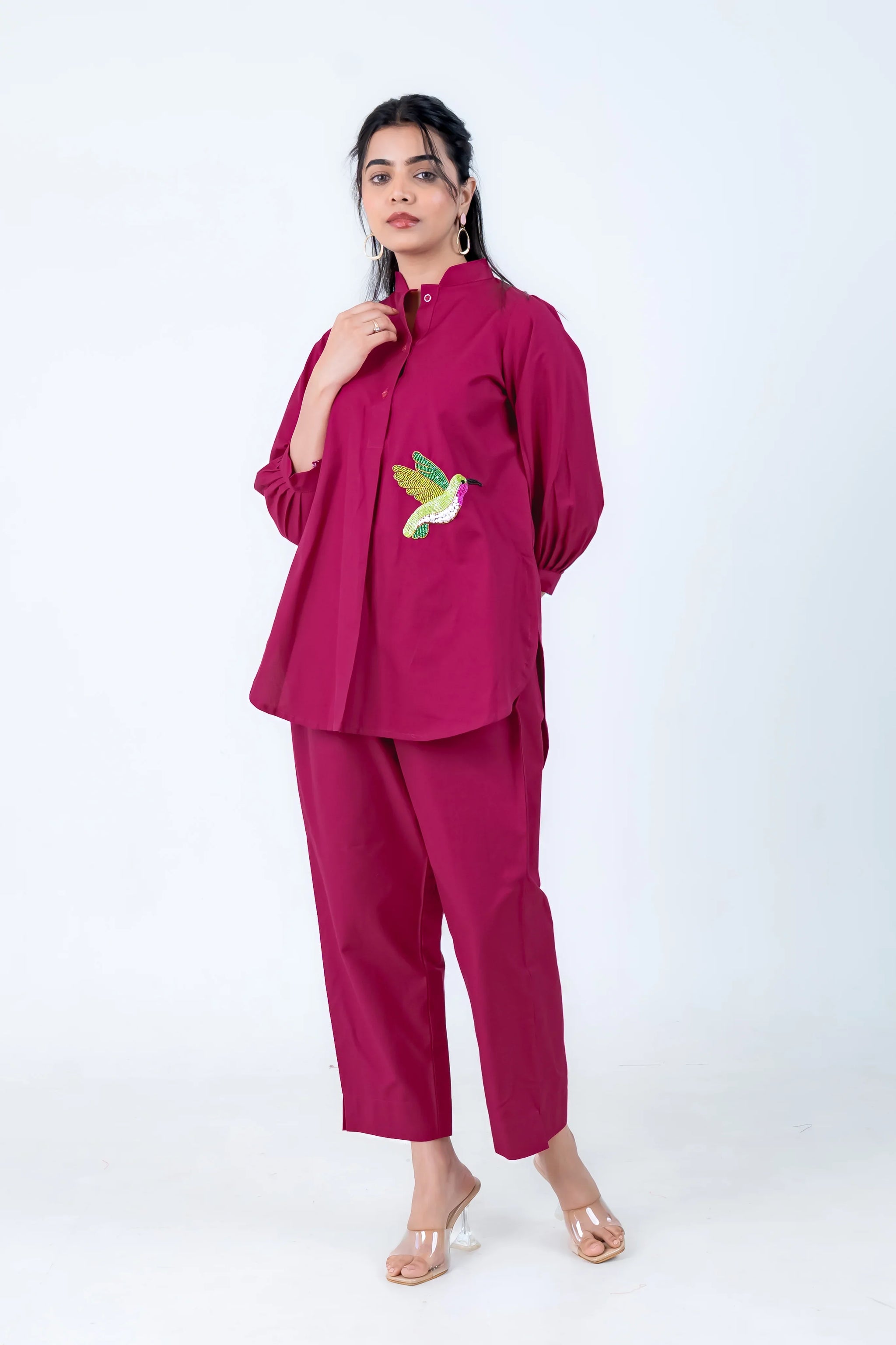 Magenta women's co-ord set with sequin hummingbird embroidery, long sleeves, and wide-leg pants
