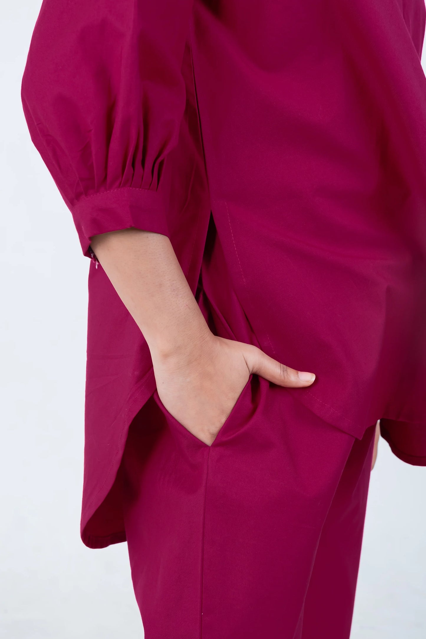 Magenta women's dress with puff sleeves and side pockets, comfortable everyday style