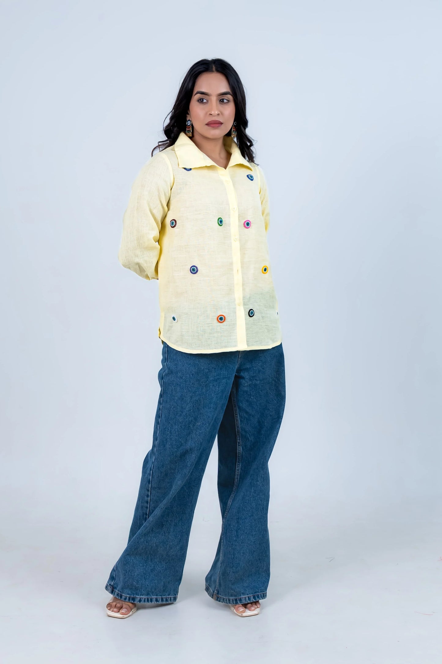 Yellow embroidered shirt with wide-leg jeans for trendy everyday women's fashion