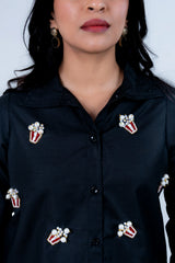 Black shirt with beaded popcorn embellishments, stylish women's fashion