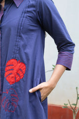 Navy blue dress with red monstera leaf embroidery and contrast stitching, stylish everyday wear
