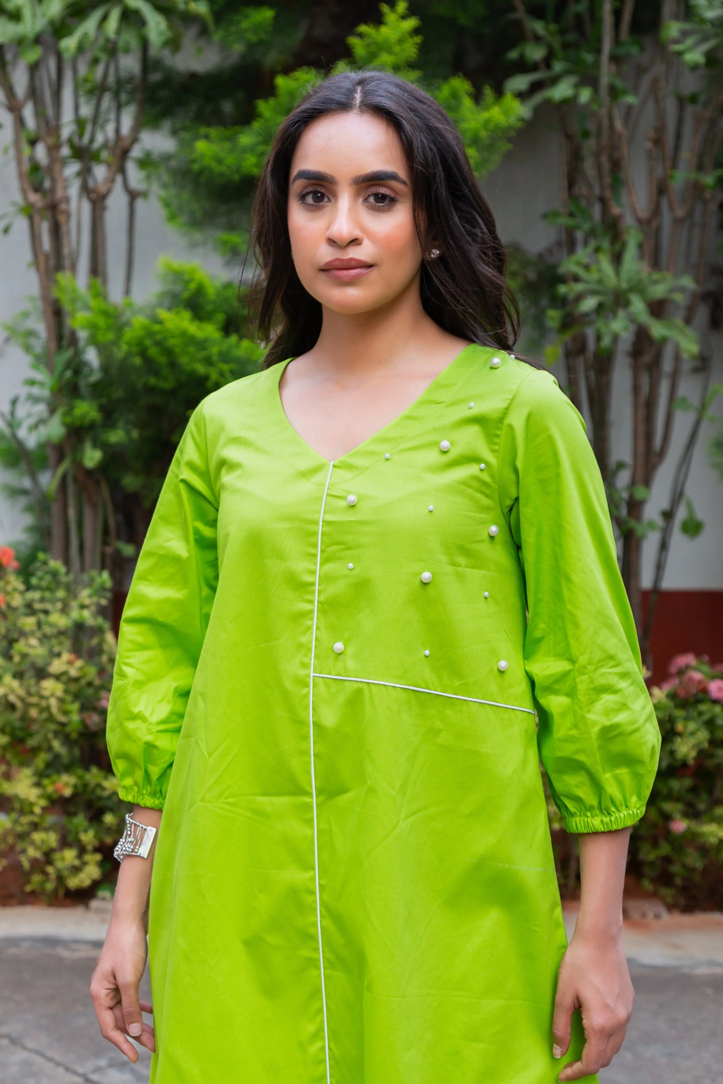 Vibrant green dress with pearl embellishments and puff sleeves for women