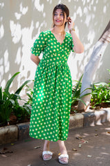 Green heart print midi dress with puff sleeves, perfect for everyday wear and casual outings.